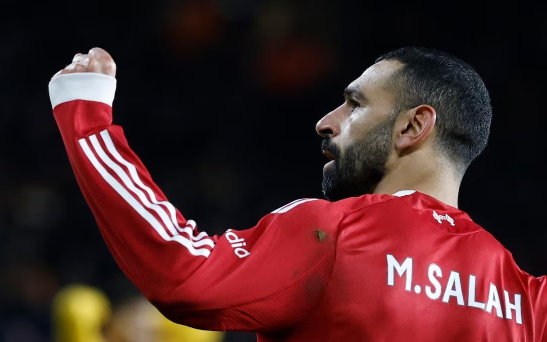 محمد صلاح لاعب ليفربول يحتفل بتسجيل هدف في مرمى ولفرهامبتون واندررز بالدوري الإنجليزي الممتاز لكرة القدم في ولفرهامبتون يوم 3 مارس 2026. رويترز