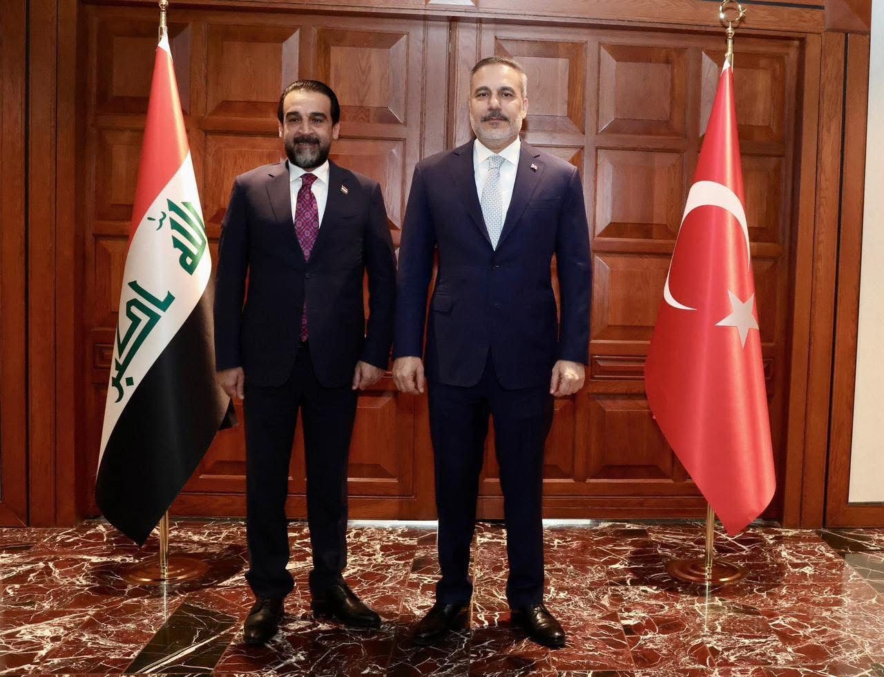 هاكان فيدان والحلبوسي2.jpeg